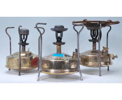 A collection of 3 vintage Primus stoves in brass to include a Monitor, Optimus and a Pri-mus. All with notation to the reserv