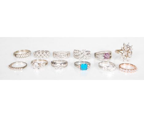 A selection of 12 stamped 925 silver ladies dress rings in a selection of styles, most set with cz's or diamonique stones to 