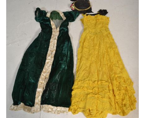 A 19th Century Victorian fancy dress / dressing up costume / clothing to include a dress in yellow material, a velvet cloak w