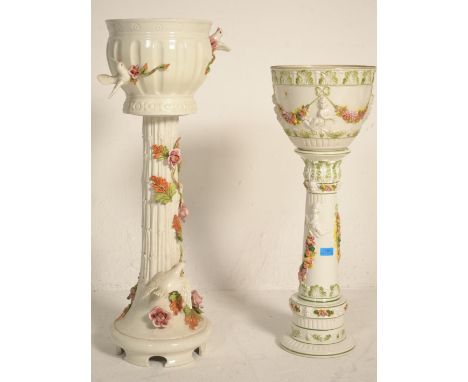 Two vintage 20th Century Italian ceramic planters raised on columnal supports to include one decorated with applied florals a