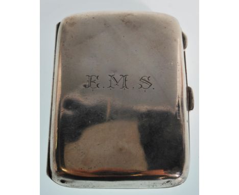 A silver hallmarked W H Haseler Ltd cigarette case of rectangular form engraved with initials E. M. S.. Hallmarked Birmingham