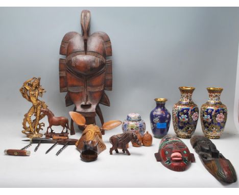A collection of unusual African tribal items to include a large Ashanti face mask, wooden carved figural wall mask in the for