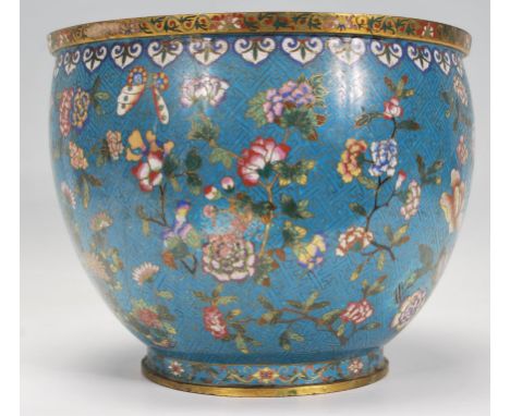 A late 19th Century circa 1880 Chinese Cloisonne brass and copper planter having a blue enamelled ground with floral sprays a