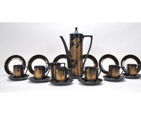 A retro 20th Century Portmeirion coffee service in the Phoenix pattern by John Cuffley, consisting of coffee pot, six cups an