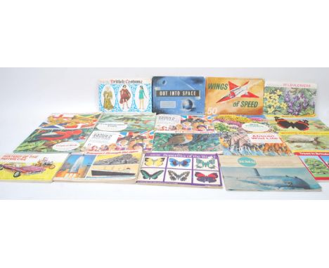 A collection of Brooke Bond Tea trade cards set within albums to include Wild Flowers, Trees In Britain, Wildlife in Danger, 