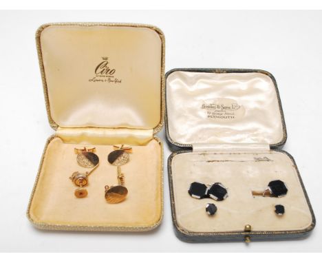 A pair of vintage 9ct gold hallmarked cufflinks together with a 9ct gold tie pin and another. Gross weight 8.1g