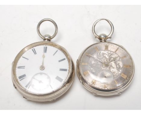 A Chester hallmarked silver open faced key wind pocket watch having inset white enamel dial together with another silver hall