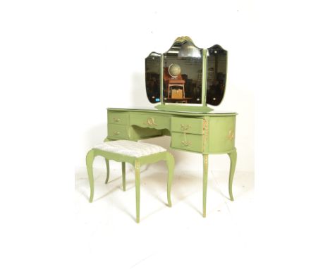 A good quality painted Louis 15th French shabby chic style dressing table and stool. Raised on slender supports having a seri