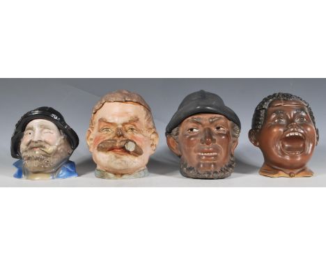 A collection of four Austrian / German ceramic novelty tobacco jars in the manner of Bernard Bloch to include a gentleman wit