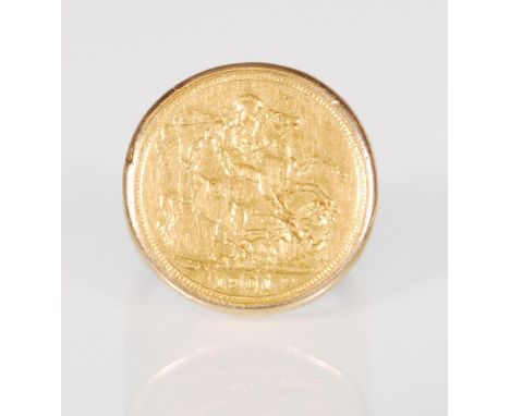 A stamped 375 9ct gold ring set with a 1901 full gold sovereign to the head. Total weight 18.7g. Size V.5.