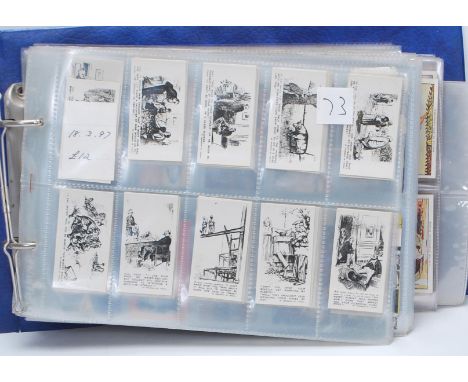 A collection of vintage 20th Century cigarette trade cards over an album containing full sets to include Rothmans Punch Jokes