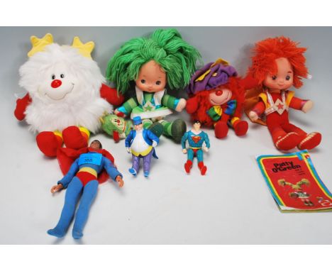 A collection of four retro 20th Century Mattel Rainbow Bright dolls and plush toys to include Patty O'Green, Red Butler, PLus