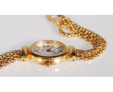 A silver hallmarked gold vermeil Veronese ladies wristwatch having a three popcorn chain bracelet strap, oval mother of pearl