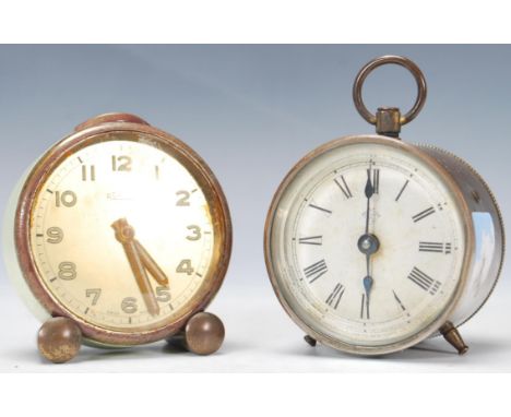 A late 19th century miniature American drum clock by Ansonia Clock Co USA, the back inscribed 'Pat April 23d 1878', brass bod