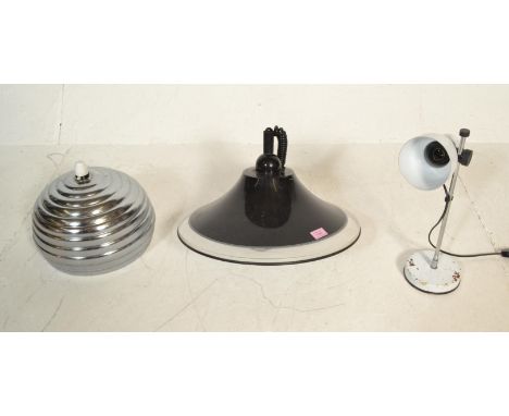 A vintage retro rise and fall ceiling light fitting in the manner of&nbsp;Harvey I. Guzzini together with another of similar 