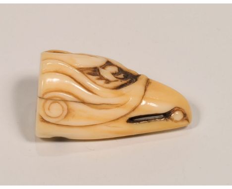 A RARE SUBJECT JAPANESE EDO PERIOD CARVED IVORY NETSUKE OF A SEA EAGLES HEAD, carved from the very tip of the tusk section, h