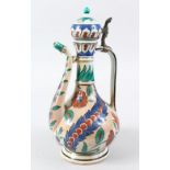 A 19TH CENTURY IZNIK STYLE HARRIS EWER, Inscribed ' a la Paix Paris', with floral decoration, 28.5cm