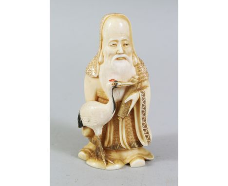 A GOOD JAPANESE MEIJI PERIOD CARVED IVORY NETSUKE OF A LUCKY GOD, holding a scroll in his left hand, a crane by his side, art