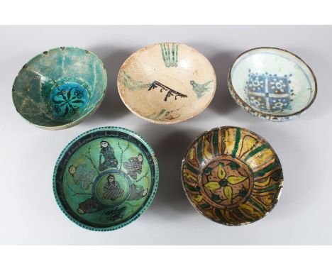 A COLLECTION OF FIVE EARLY ISLAMIC CERAMIC BOWLS, 20.5cm diameter down to 18.5cm.(5)