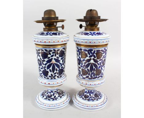 A GOOD PAIR OF BLUE AND WHITE QAJAR GLASS HOOKAH LAMP BASES, 30cm high.