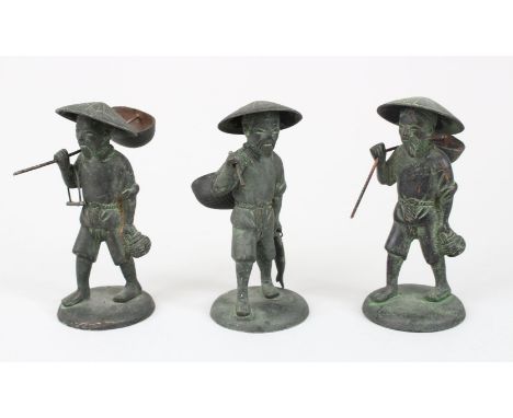 THREE GOOD 19TH / 20TH CENTURY CHINESE BRONZE FIGURES, depicting working men each holding their tools, 11cm high. (3)