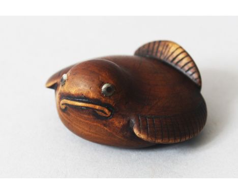 A JAPANESE 20TH CENTURY CARVED WOODEN NETSUKE OF A FUKURA SUZUME, the bird in seated position, the feet carved to the base, t