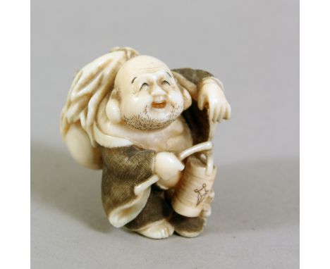 A JAPANESE MEIJI PERIOD CARVED IVORY NETSUKE OF HOTEI, stood with his lucky sack over his shoulder, with a rat by his foot, s