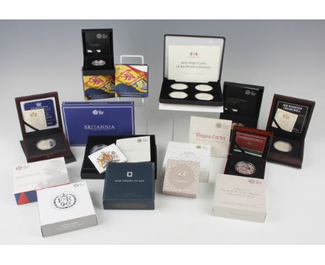 A collection of Elizabeth II Royal Mint silver proof commemorative coins, including a two pounds 2015 commemorating the 800th