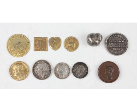 A collection of diminutive coins and medallions, including an Edward VII Maundy penny 1903, a George V Maundy twopence and pe