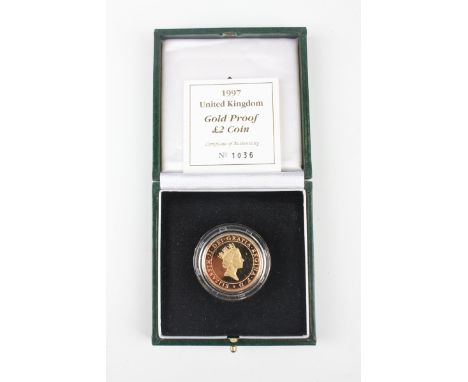 An Elizabeth II Royal Mint gold proof two pounds 1997, cased with certificate, No. 1036, together with a signed print.Buyer’s