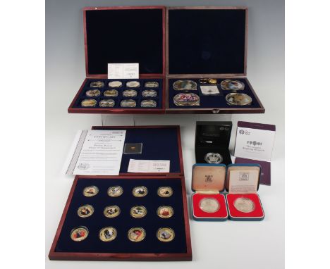 A collection of modern silver and base metal commemorative coins, including an Elizabeth II Royal Mint silver proof piedfort 