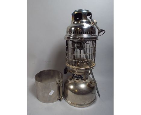 A Chromed Hipolito Hurricane Lamp.