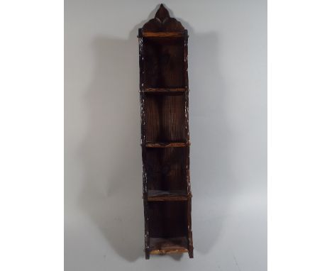 A Wall Hanging Five Shelf Display.