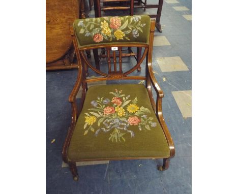 A Pretty Tapestry Upholstered Inlaid Mahogany Edwardian Nursing Chair on Castors.