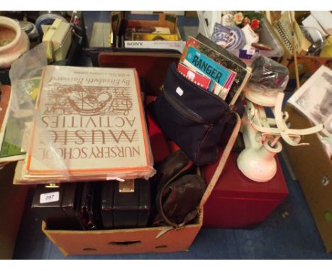 A Collection of Sundries to Include Sheet Music Books Briefcases Scout and Guide Magazines Etc. Kitchen Scales.