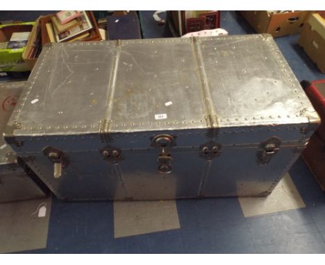 A Large Aluminium Travelling Trunk. 