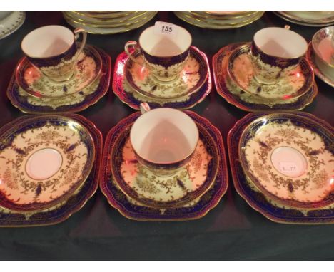 A Part Blue and Gilt Noritake Tea Set Comprising Four Trios Three Saucers and Three Side Plates.