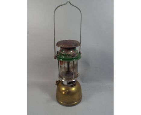 A Brass and Enamelled Hurricane Lamp.