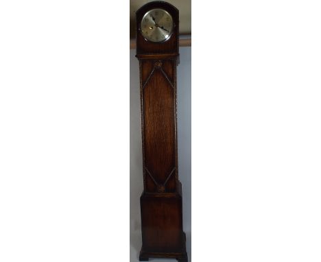 An Oak Grandmother Clock.