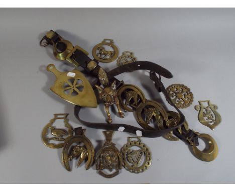 A Collection of Victorian Leather Harness Straps with Brasses, Horse Brasses, Fox Door Knocker and Brass Iron Stand.