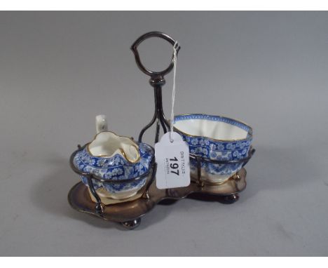 A Spode Sugar and Cream in Silver Plated Stand.
