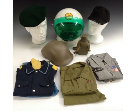 A late 1970s Six Million Dollarman Dressing up NASA Flight suit and helmet;  an Army Soldiers uniform;  a W H Kendal Ltd Play