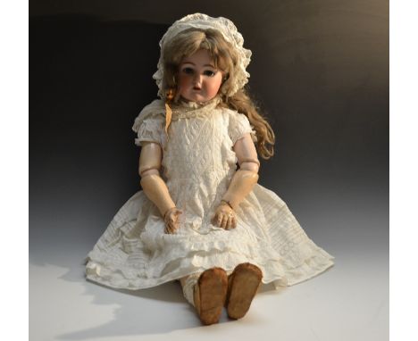 A large Kammer & Reinhardt/ Simon & Halbig bisque head socket doll, open close and side to side blue glass eyes, open mouth, 