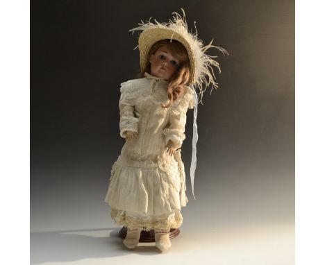 Max Handwerck - a German bisque head child doll, impressed 0 1/2, open close blue eyes, open mouth, light brown mohair wig, w