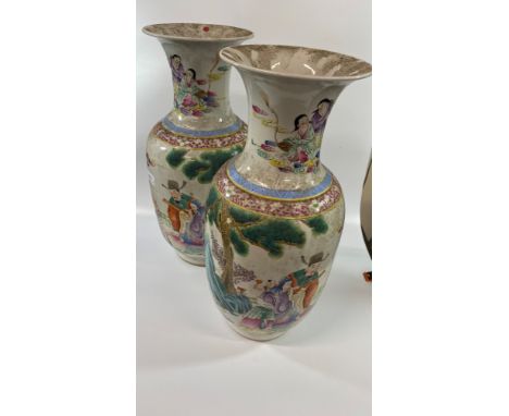 A Pair of Chinese Famille Verte Vases. 20th century. Republic Period. Decorated with figures in a landscape. Red seal mark to