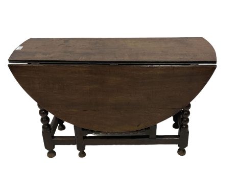 18th century drop-leaf oak dining table, oval top fitted with two drawers, raised on bobbin-turned supports with double gate-