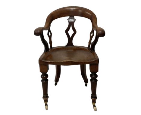 Victorian mahogany desk chair, bow-back over lozenge pierced splats and shaped saddle seat, raised on turned supports termina