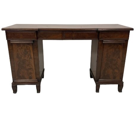 William IV mahogany reverse-breakfront twin pedestal sideboard, shaped rectangular top with moulded edge, fitted with four fr