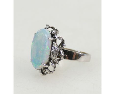 18ct white gold ring set large and colourful opal 16mm x 10.5mm. Ring size L.