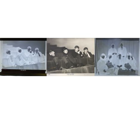 DEZO HOFFMAN GLASS NEGATIVES. Two original glass photo negatives, one depicting an image of The Beatles in a theatre circa 19